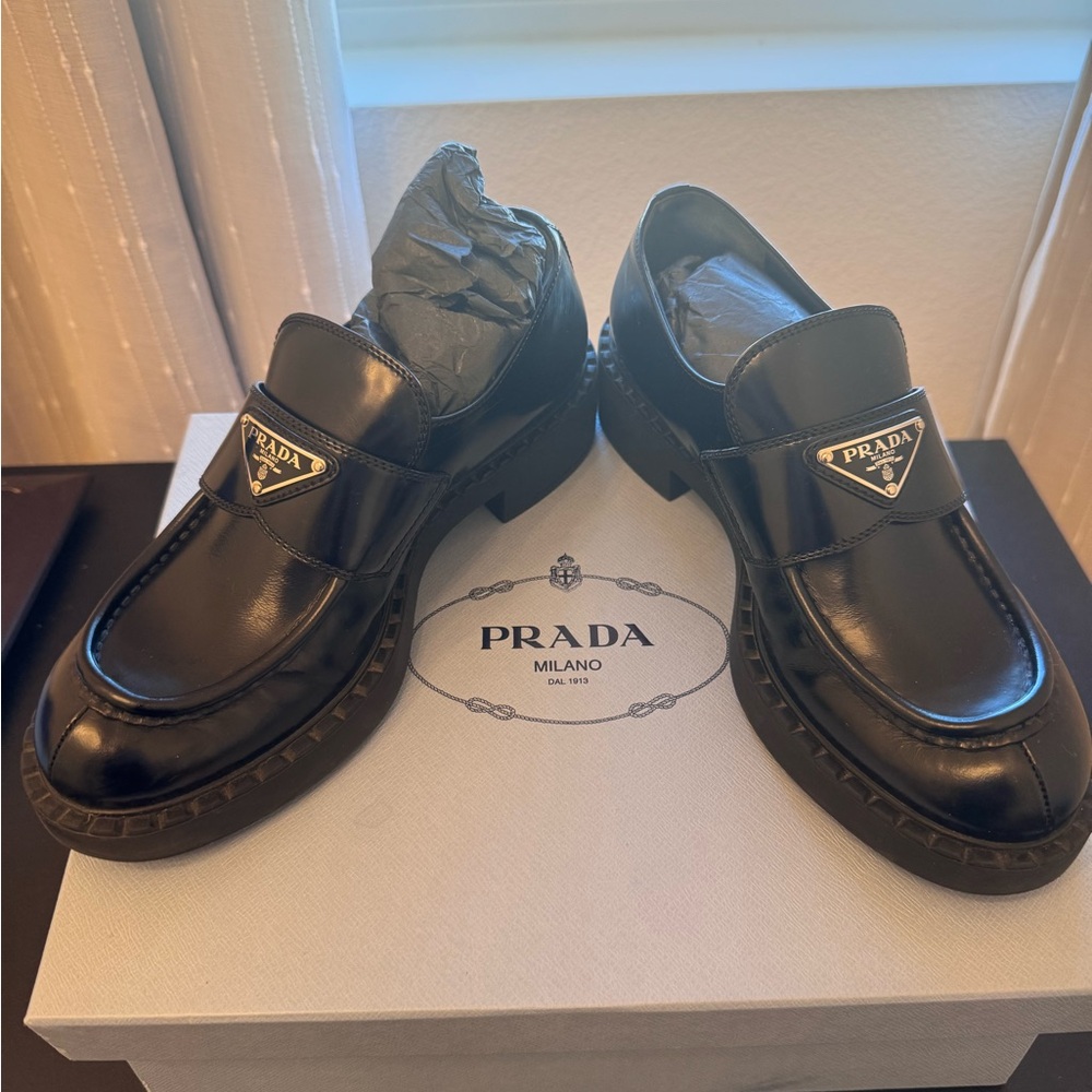 Prada women’s Black Leather Slip-On Loafers
